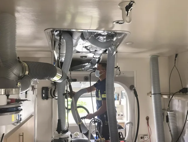 Lincoln Air Duct Cleaning specialist performing precise mobile home duct cleaning in Lincoln