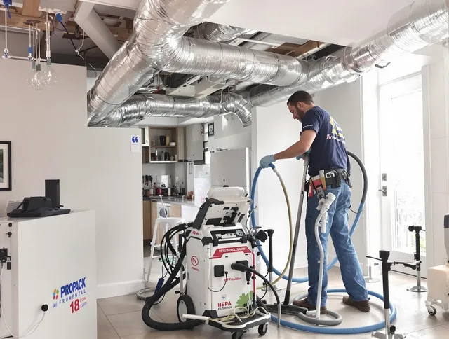 Lincoln Air Duct Cleaning technician performing advanced pure duct cleaning with specialized equipment in Lincoln